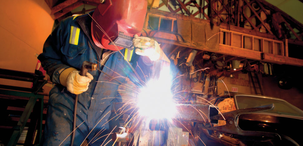 Welder at Work --- Image by © Darren Greenwood/Design Pics/Corbis Welder at Work --- Image by © Darren Greenwood/Design Pics/Corbis